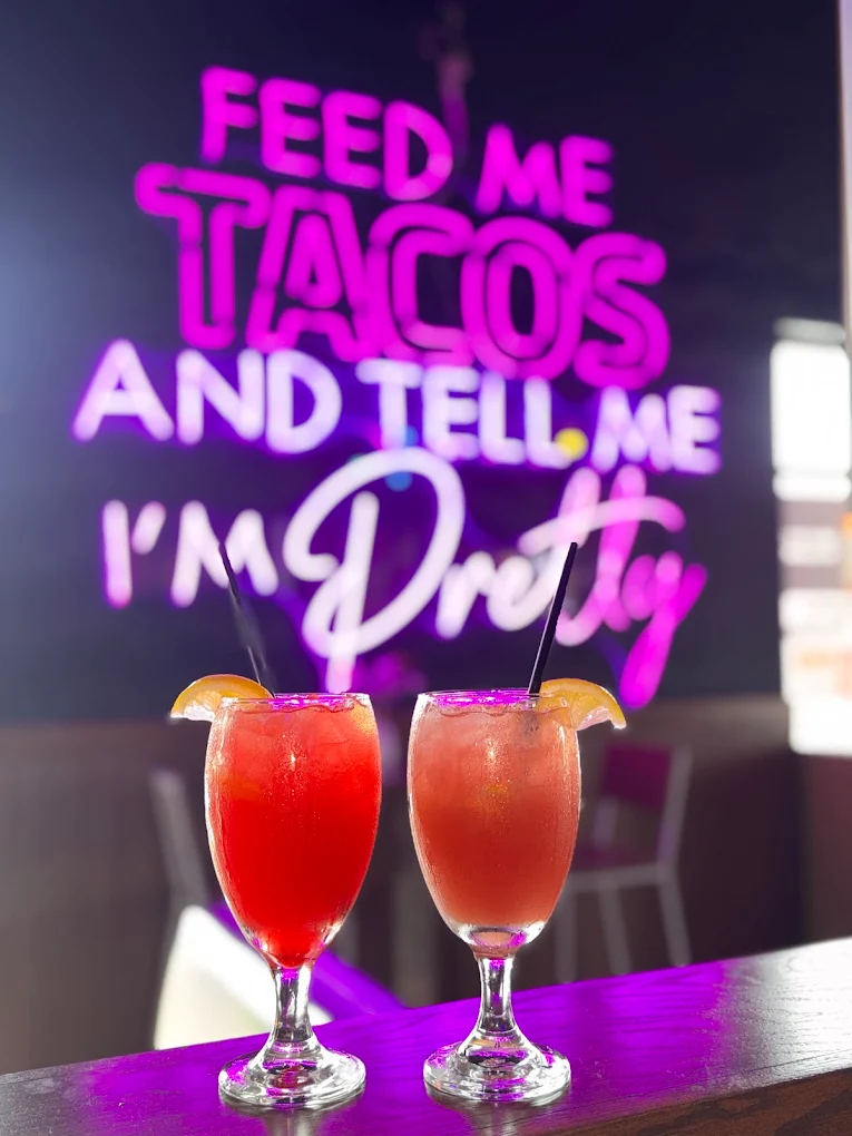 Two colorful cocktails at La Lotería
